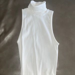 Size small turtle neck . Zara top. Has a little mark inside ( picture posted )